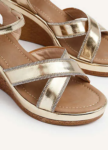 Linzi Joslyn Gold Faux Leather Wedge With Diamante Crossover Front Straps | Grattan