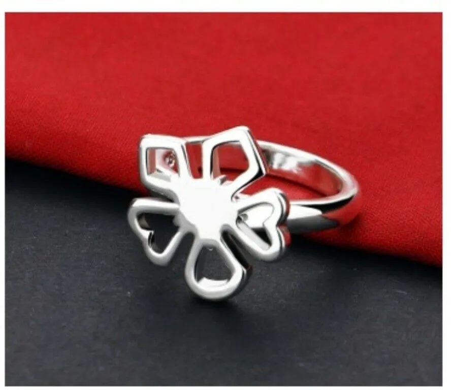 Solid White Gold Ring With Simple Floral Face Design SM12