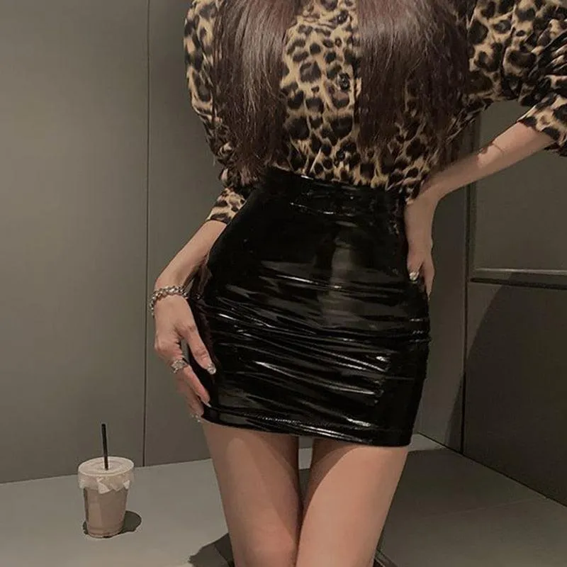 Unleash Your Gothic Side with our Glossy PU Leather Mini Skirt